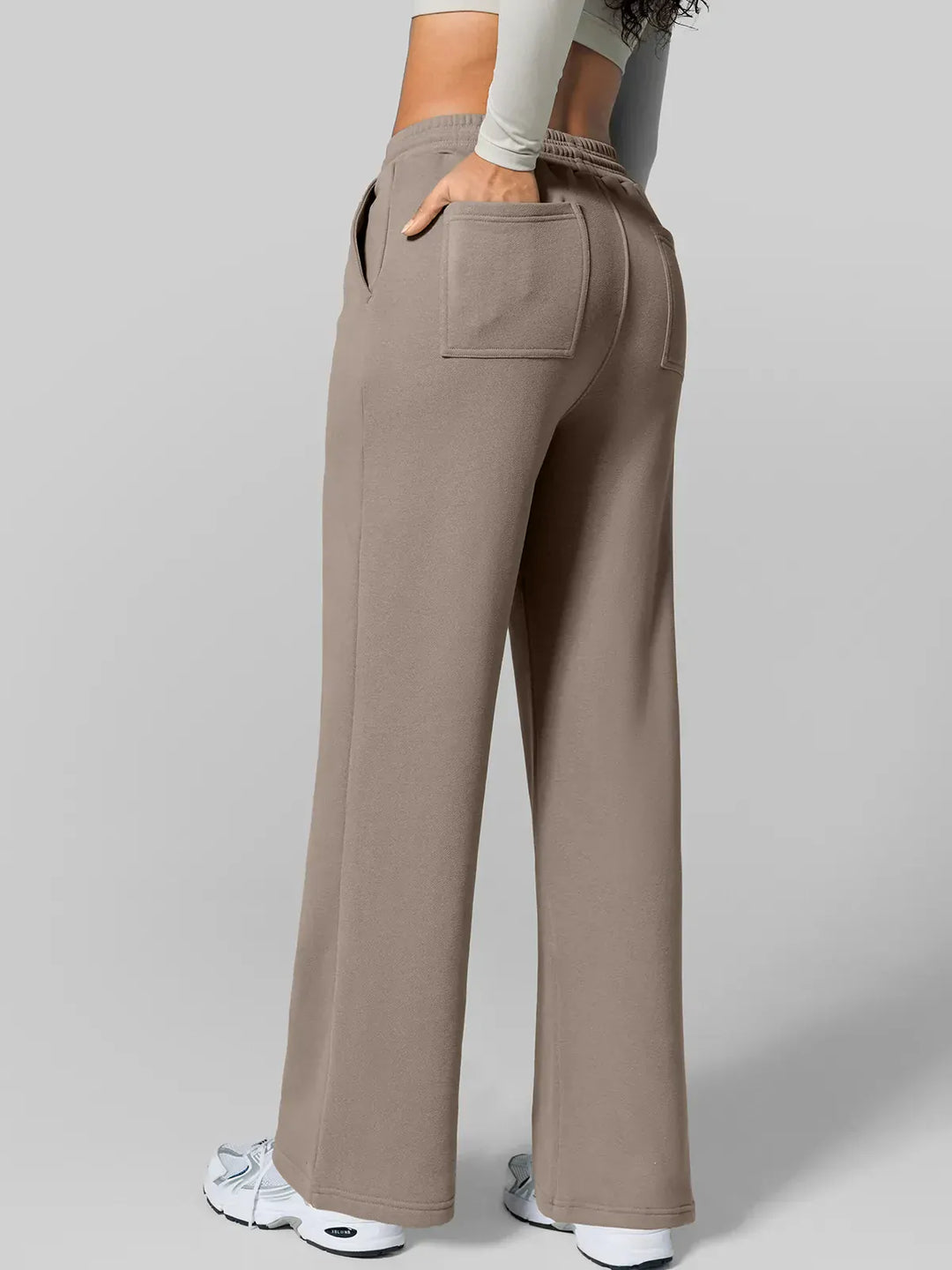 A model wearing a BRXL® Athleisure Drawstring Waist  Wide Leg Sweatpants in