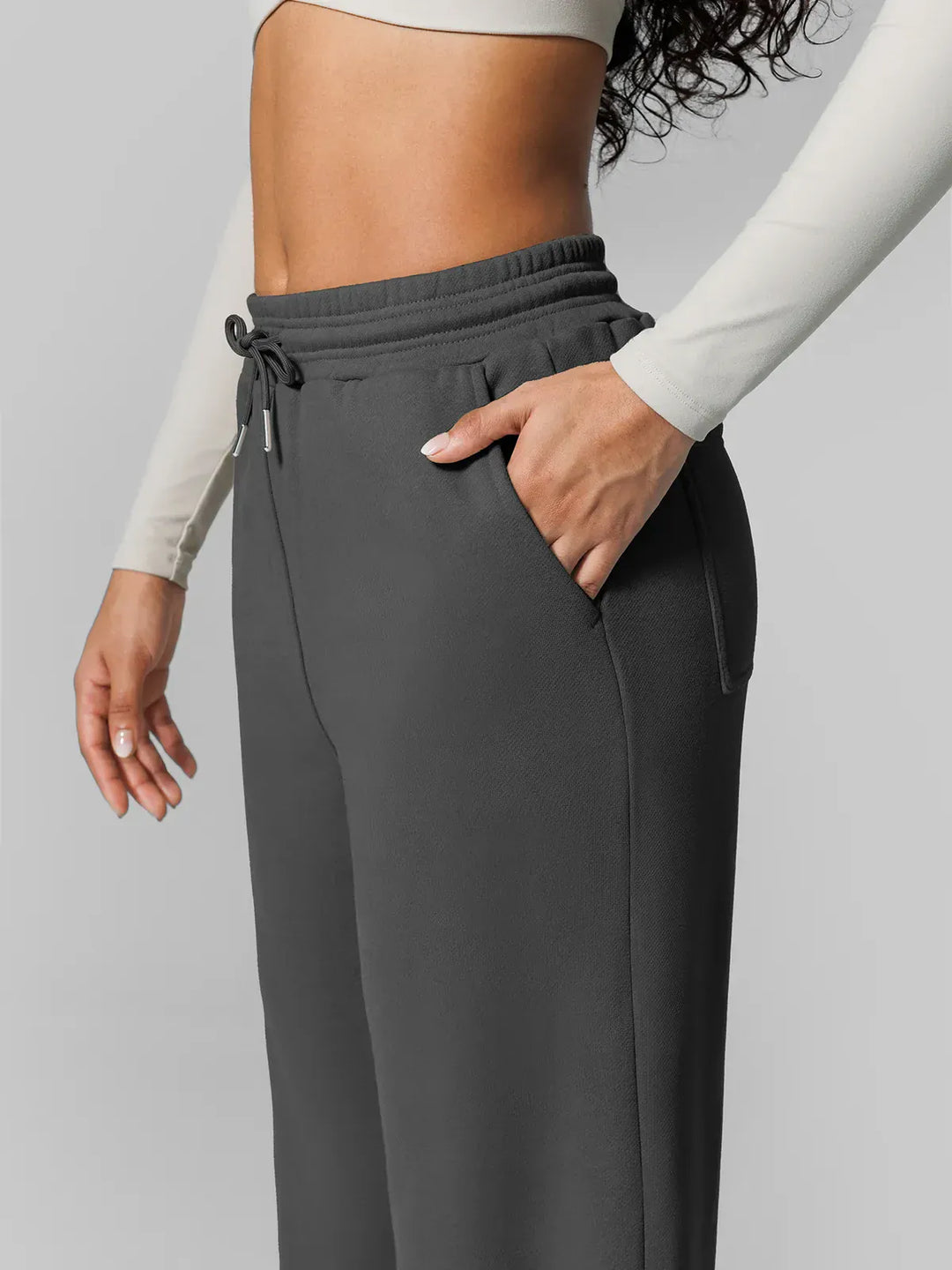 A model wearing a BRXL® Athleisure Drawstring Waist  Wide Leg Sweatpants in