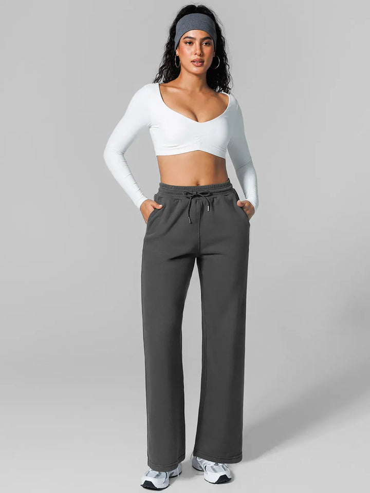 A model wearing a BRXL® Athleisure Drawstring Waist  Wide Leg Sweatpants in