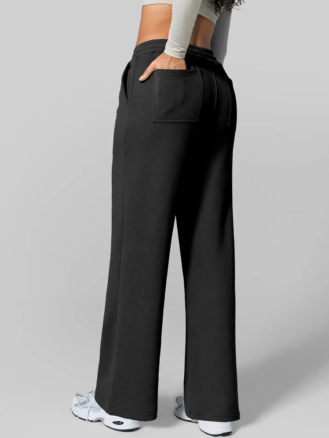 A model wearing a BRXL® Athleisure Drawstring Waist  Wide Leg Sweatpants in