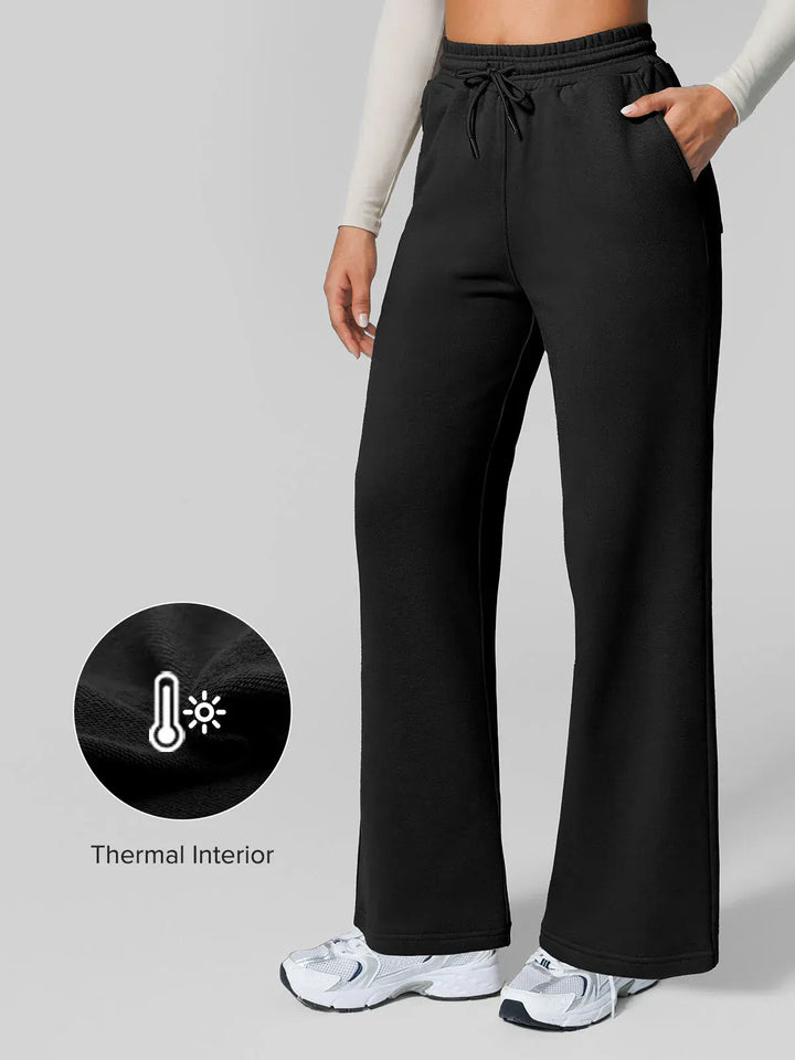 A model wearing a BRXL® Athleisure Drawstring Waist  Wide Leg Sweatpants in