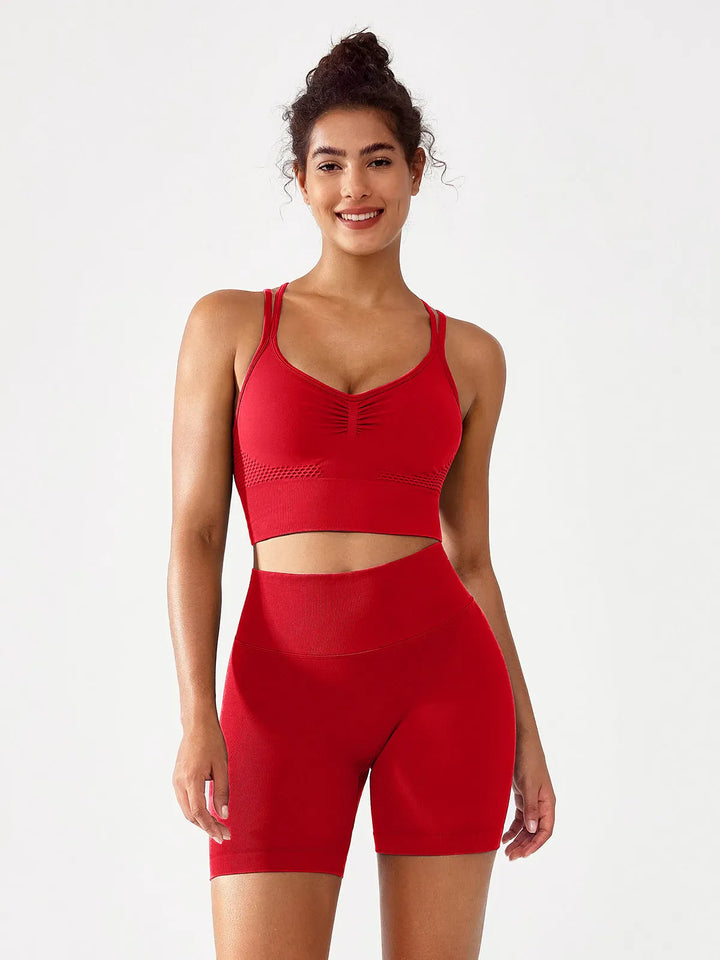 A model wearing a BRXL® BrxlGrit™ Seamless Scrunch Butt Workout Shorts in