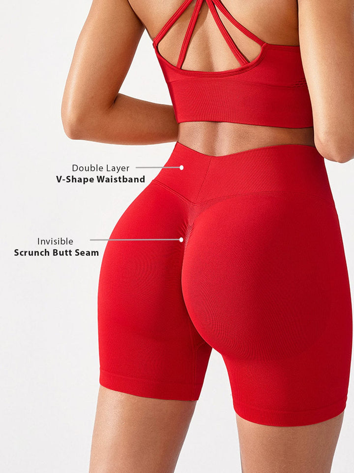 A model wearing a BRXL® BrxlGrit™ Seamless Scrunch Butt Workout Shorts in