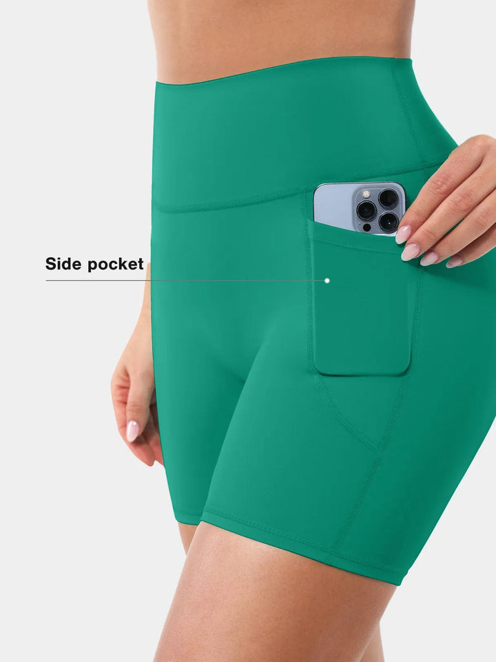 A model wearing a BRXL® BrxlZero™ Biker Shorts With Pockets in