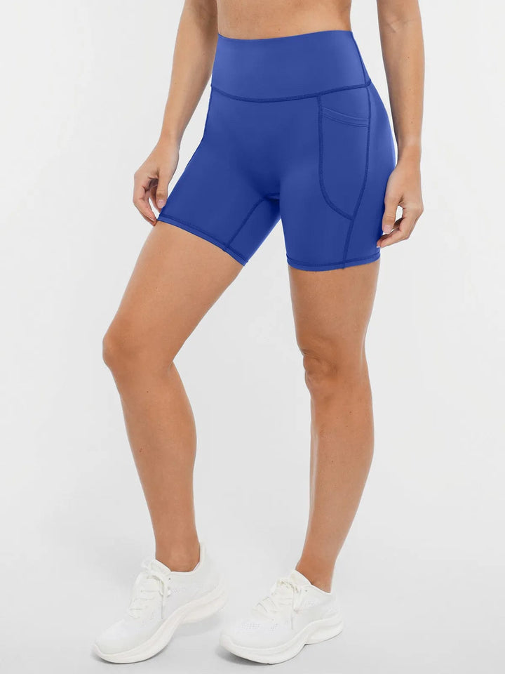A model wearing a BRXL® BrxlZero™ Biker Shorts With Pockets in