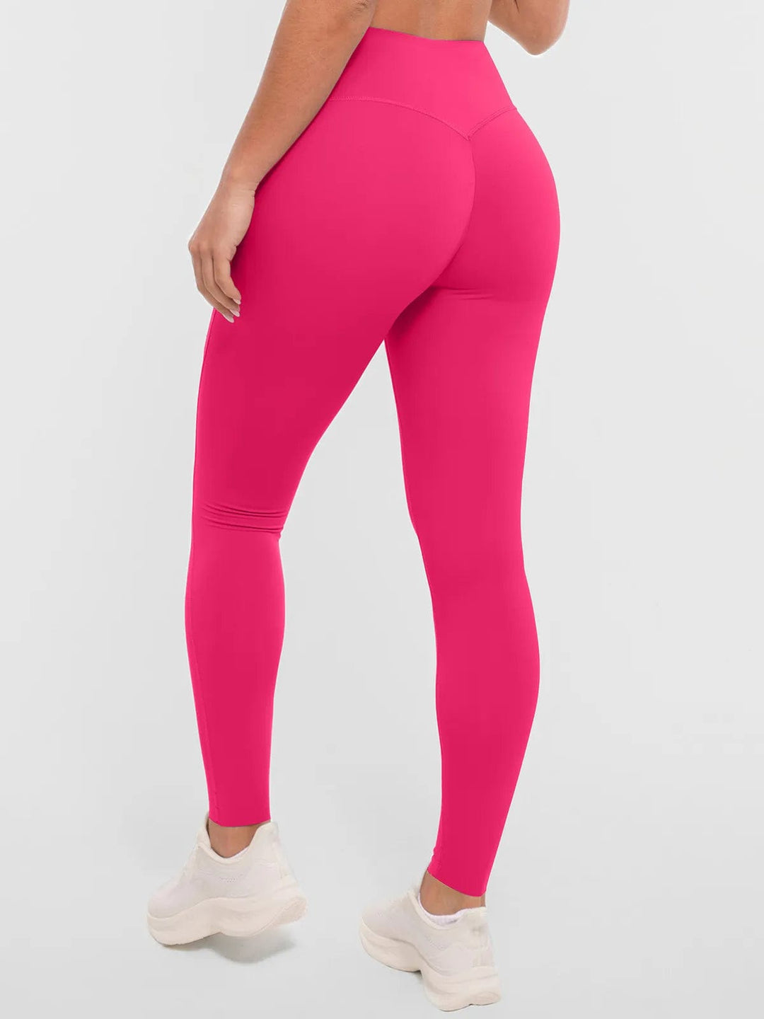 A model wearing a BRXL® BrxlZero™ High Rise Buttery Soft Yoga Leggings in
