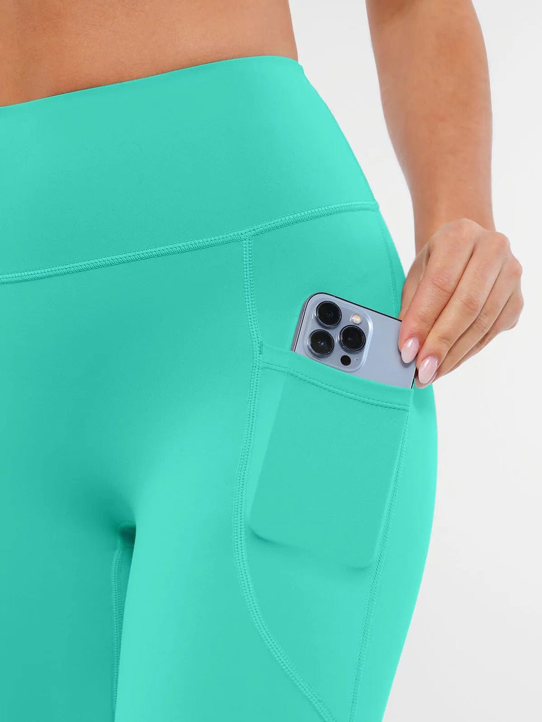 A model wearing a BRXL® BrxlZero™ High Rise Buttery Soft Yoga Leggings in