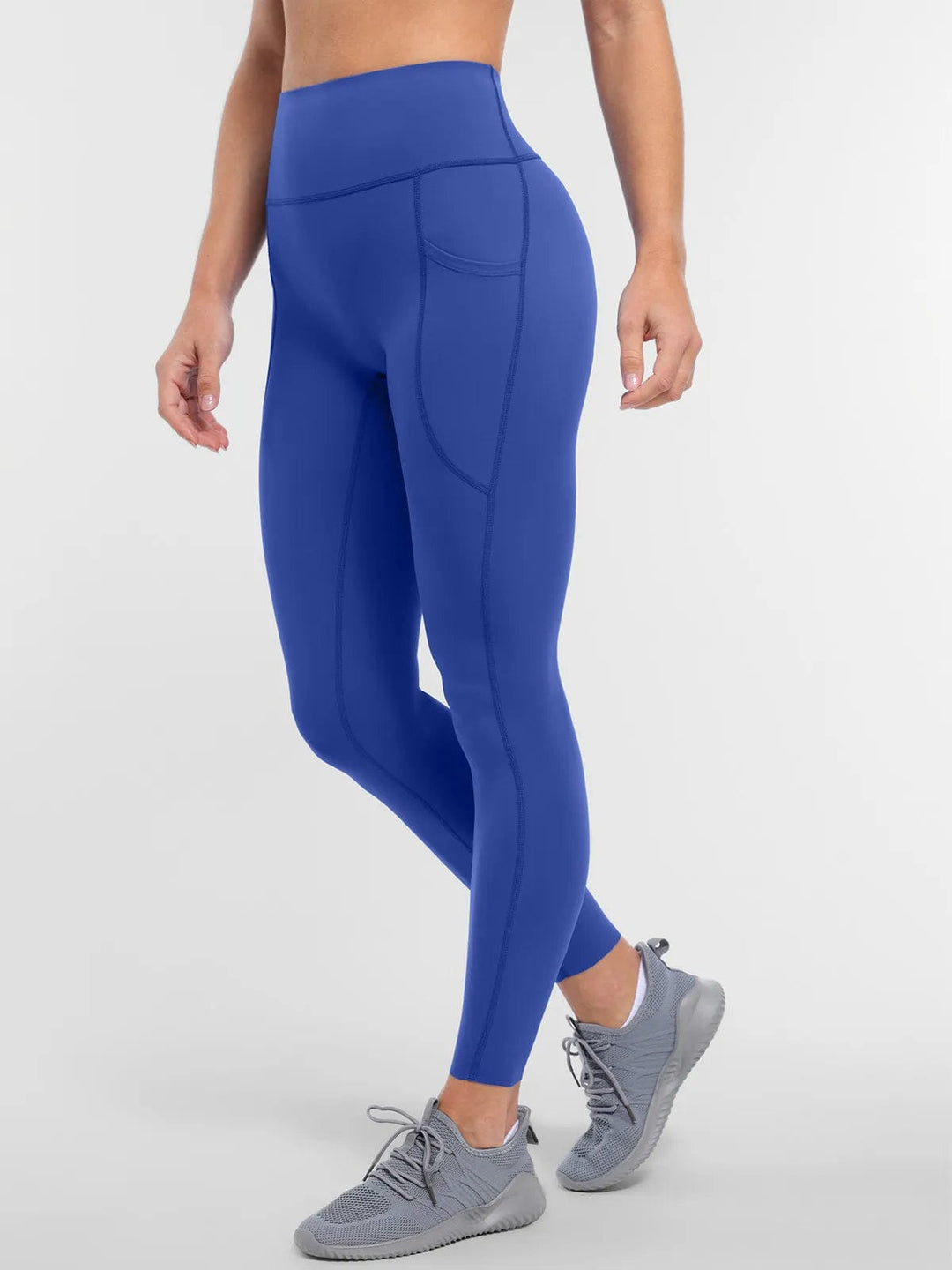 A model wearing a BRXL® BrxlZero™ High Rise Buttery Soft Yoga Leggings in