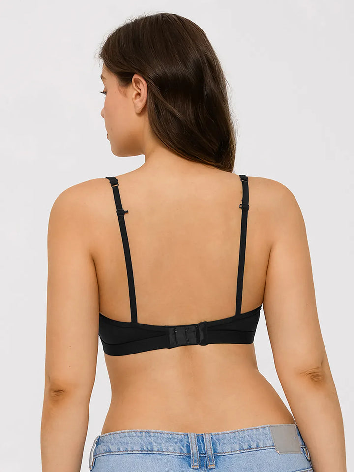 A model wearing a BRXL® Convertible Strap Supportive Sports Bra in