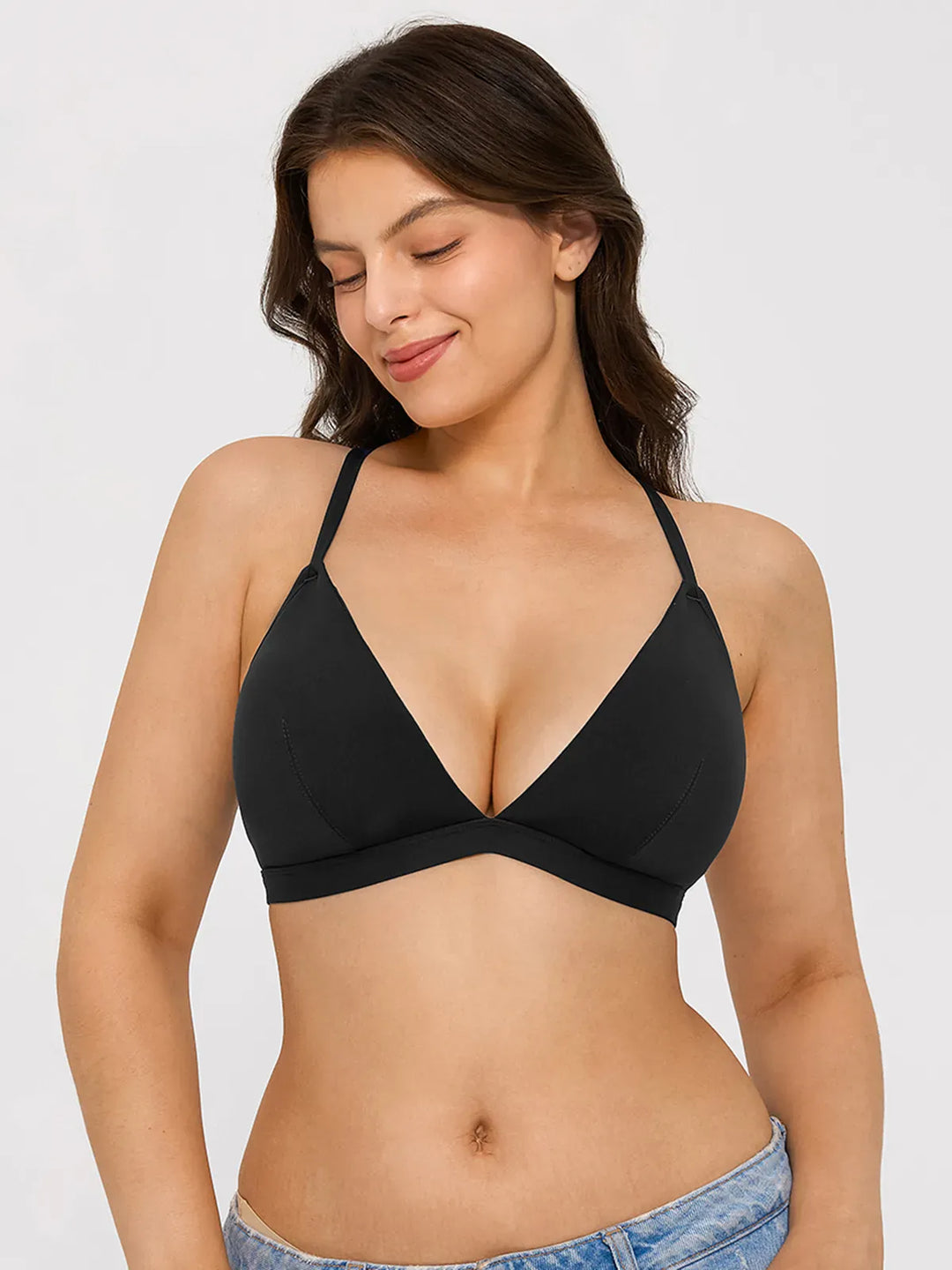 A model wearing a BRXL® Convertible Strap Supportive Sports Bra in