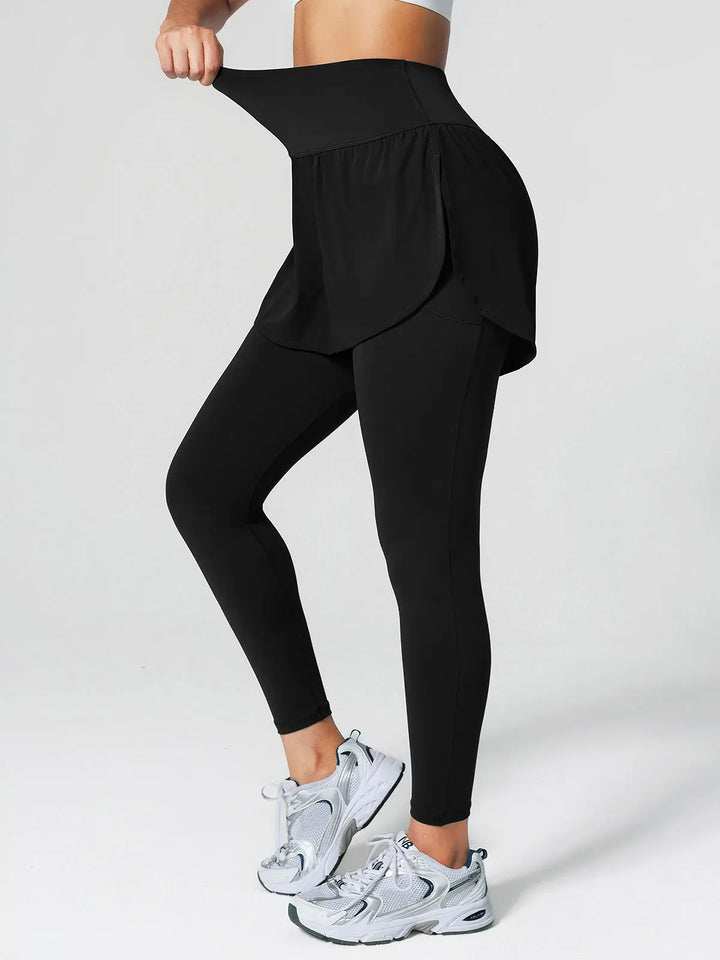 A model wearing a BRXL® Layered Combo Short Leggings in
