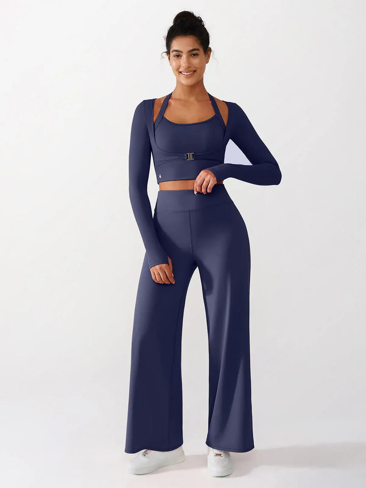 A model wearing a BRXL® Long Sleeve Halter Shrug Top with Buckle and Thumbhole in