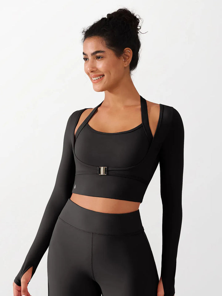 A model wearing a BRXL® Long Sleeve Halter Shrug Top with Buckle and Thumbhole in XS(0-2) / Gray