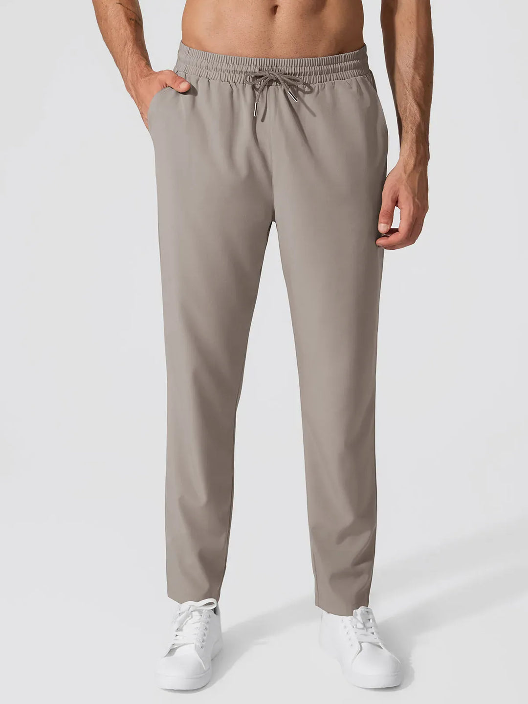 A model wearing a BRXL® Men’s  Adjustable Waist Tapered Activewear Joggers in