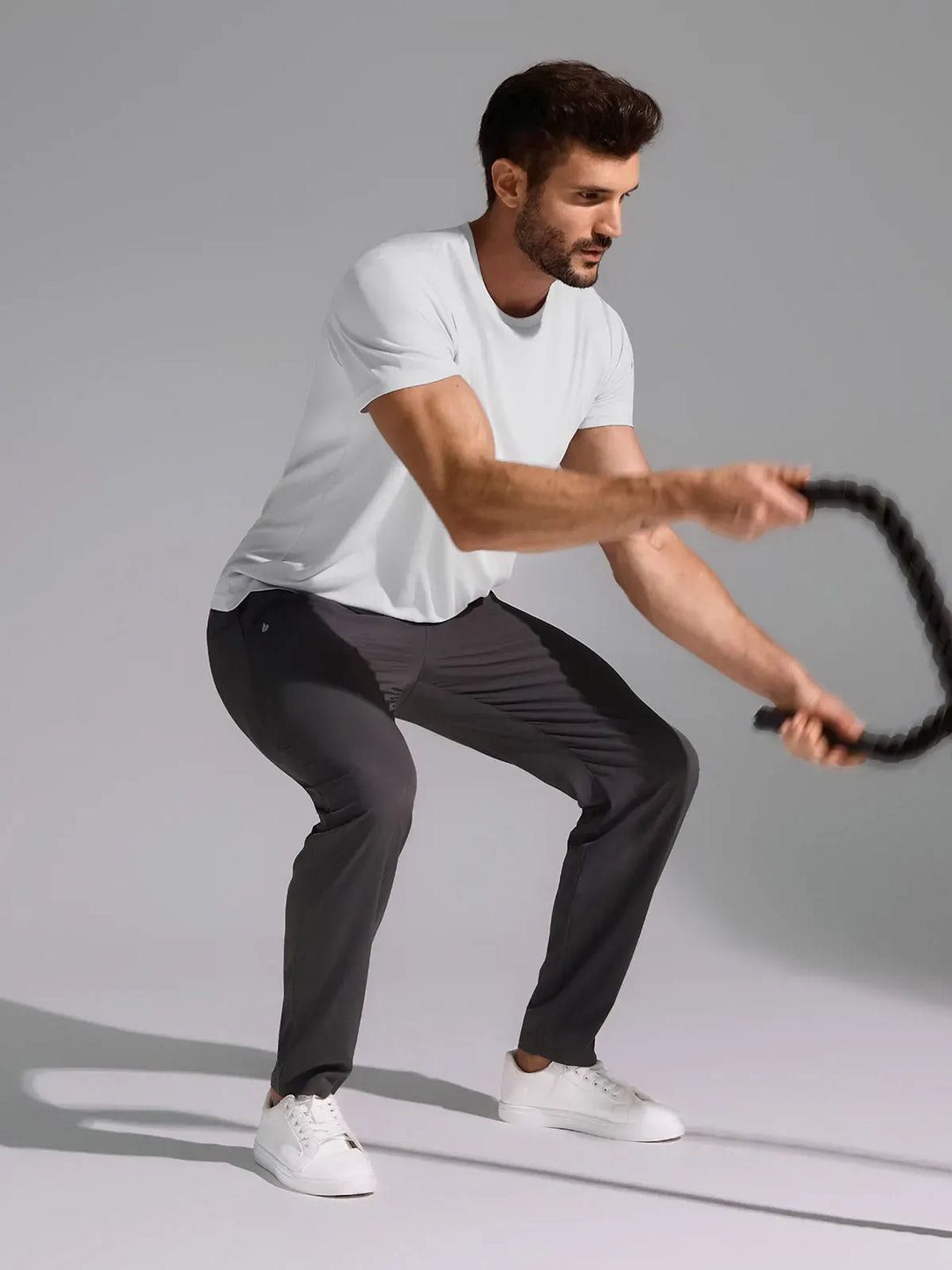 A model wearing a BRXL® Men’s  Adjustable Waist Tapered Activewear Joggers in