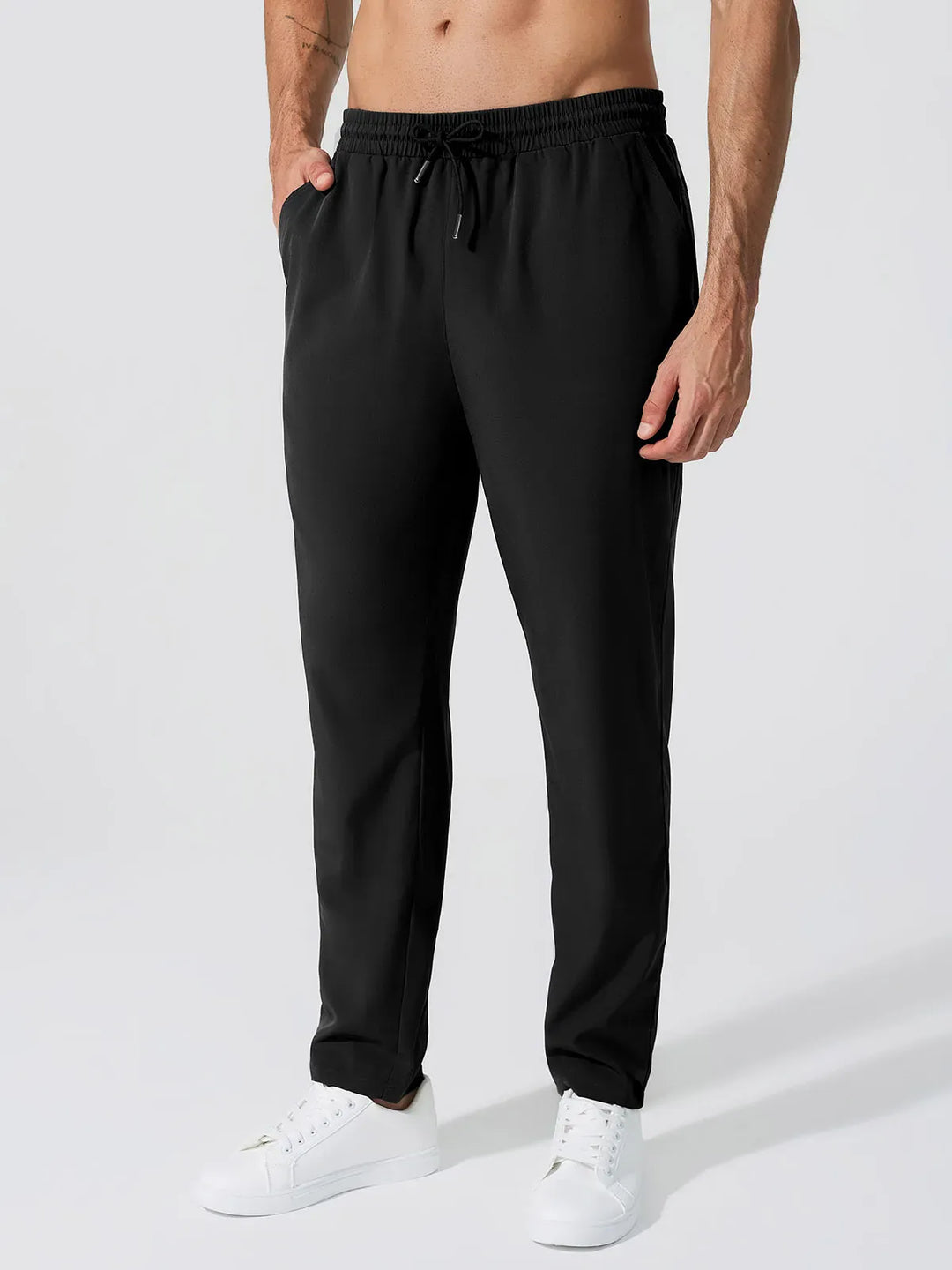 A model wearing a BRXL® Men’s  Adjustable Waist Tapered Activewear Joggers in