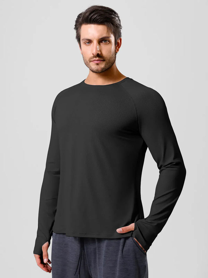 A model wearing a BRXL® Men’s Long Sleeve Thumbhole Activewear Shirt in