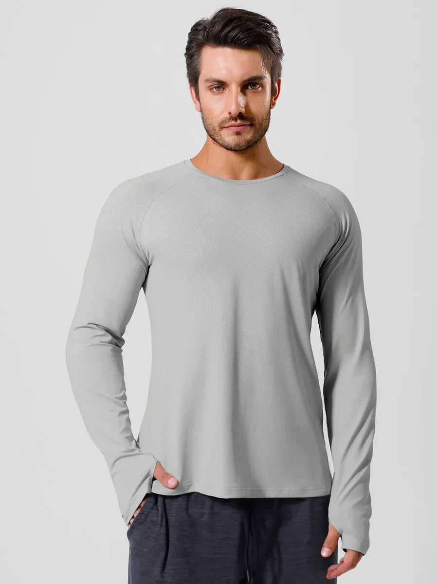 A model wearing a BRXL® Men’s Long Sleeve Thumbhole Activewear Shirt in Grey / XS