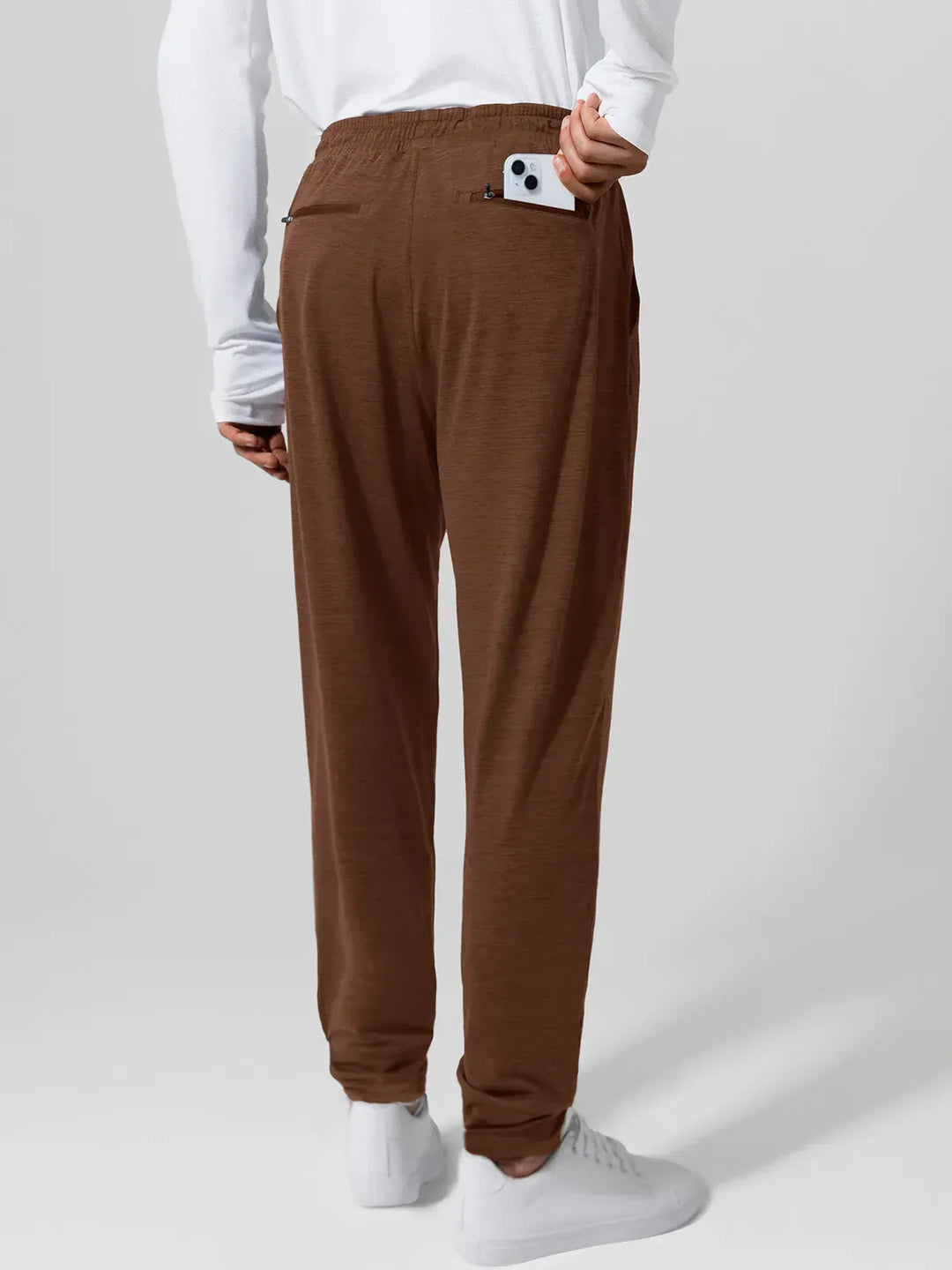 A model wearing a BRXL® Men’s Smooth Four Pockets Tapered Joggers in