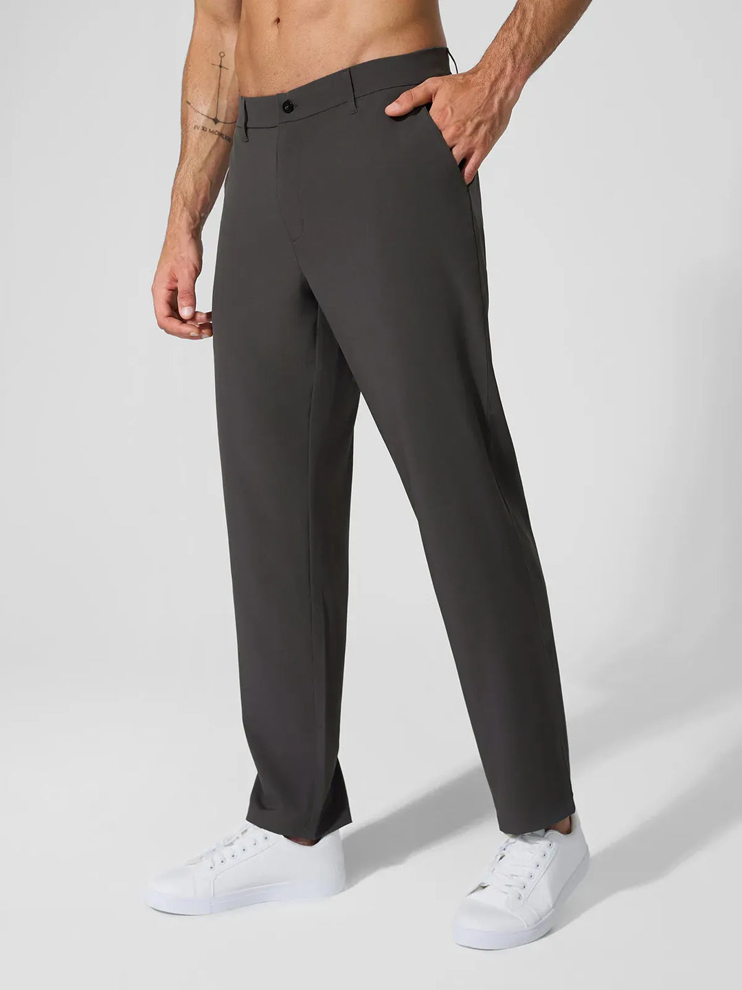 A model wearing a BRXL® Men’s Straight Leg Golf Pants in