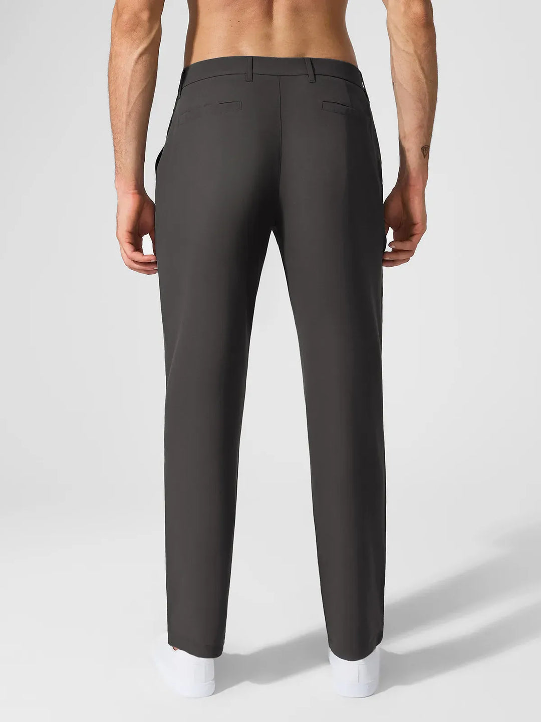 A model wearing a BRXL® Men’s Straight Leg Golf Pants in
