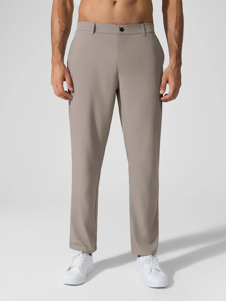 A model wearing a BRXL® Men’s Straight Leg Golf Pants in
