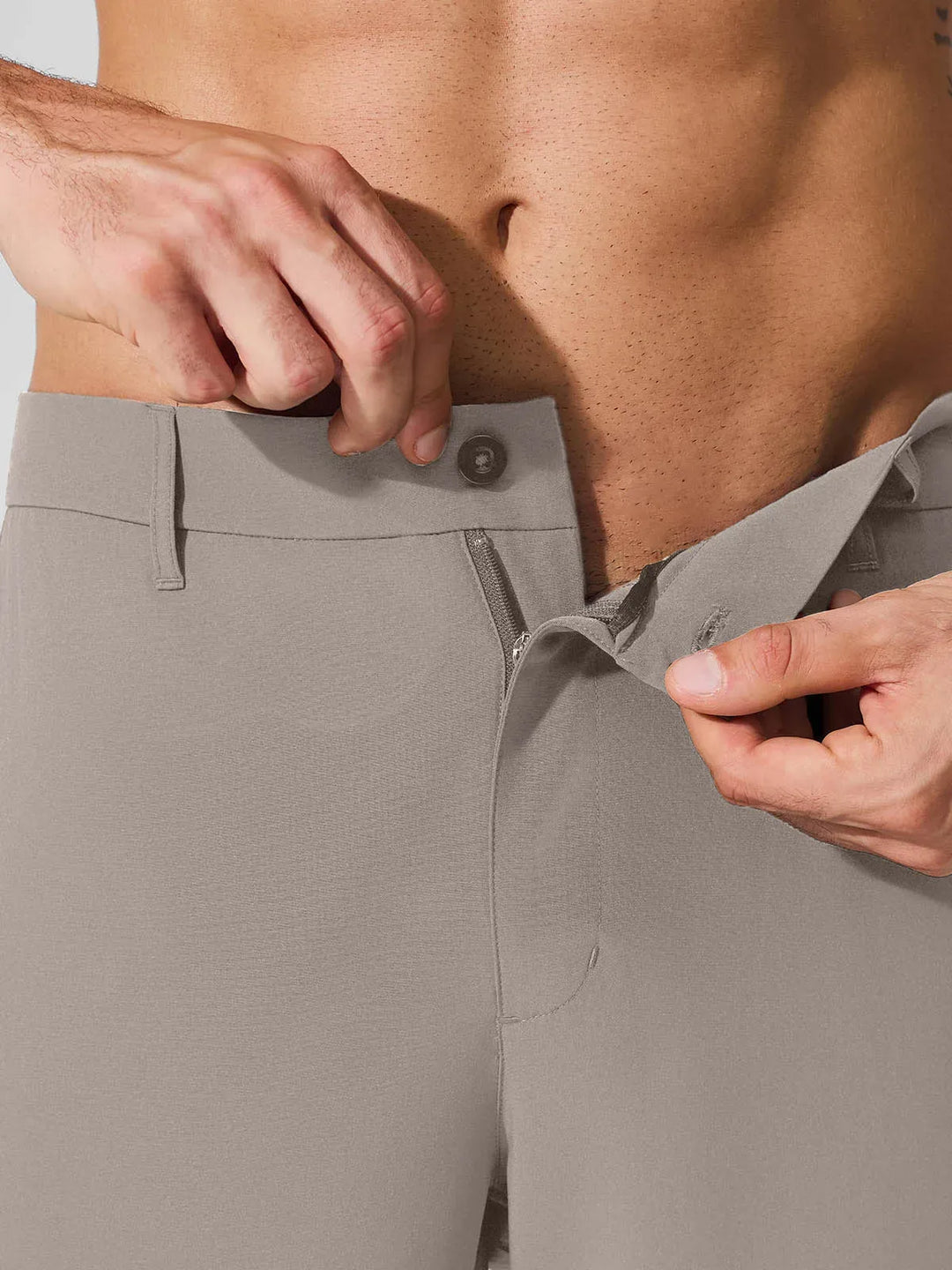 A model wearing a BRXL® Men’s Straight Leg Golf Pants in