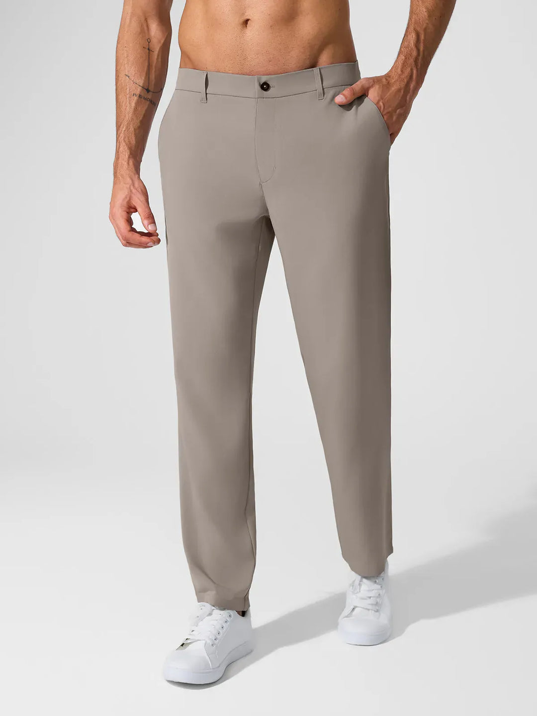 A model wearing a BRXL® Men’s Straight Leg Golf Pants in Charcoal / S