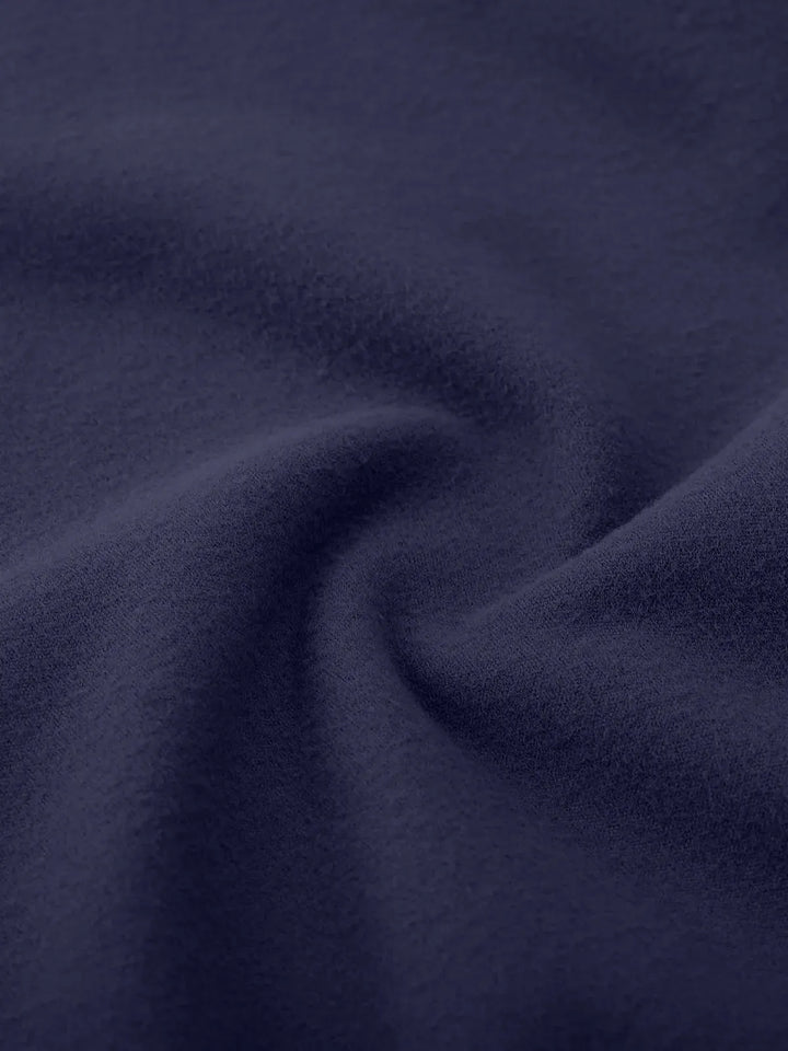 A model wearing a BRXL® One Size Fits Most Sporty High-Waisted Leggings in