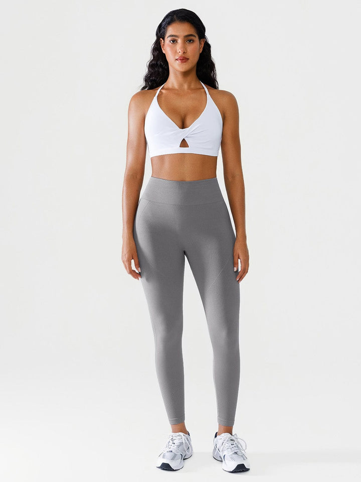 A model wearing a BRXL® Seamless Butt Scrunch Spandx Leggings With Tummy Control in