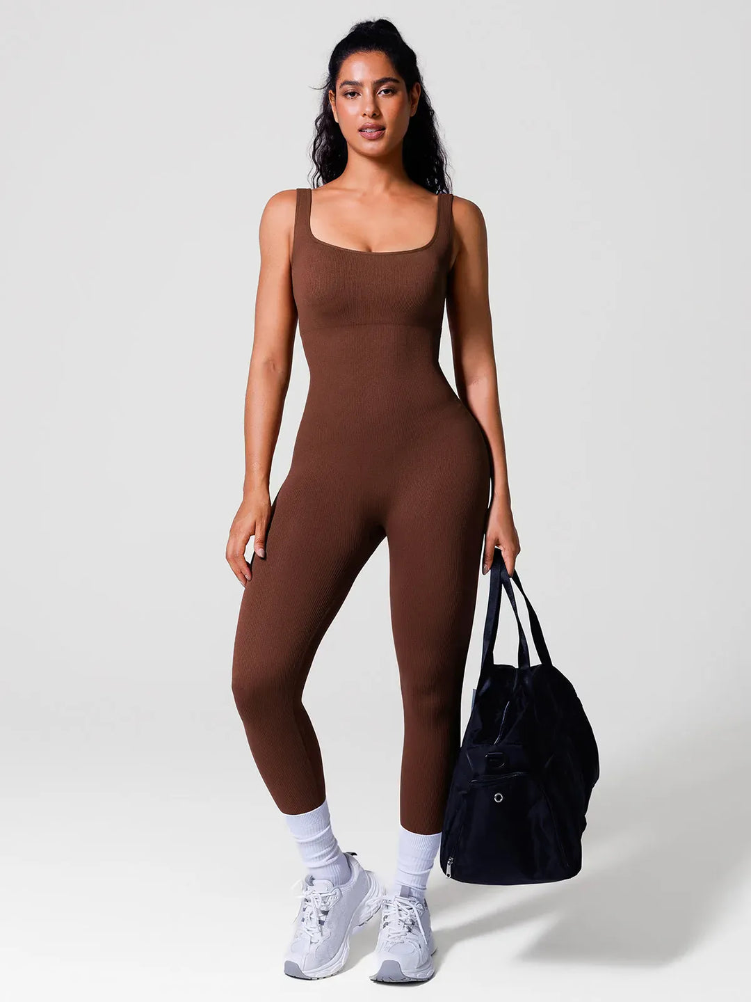 A model wearing a BRXL® Seamless Square Neck Tummy Control Jumpsuits in