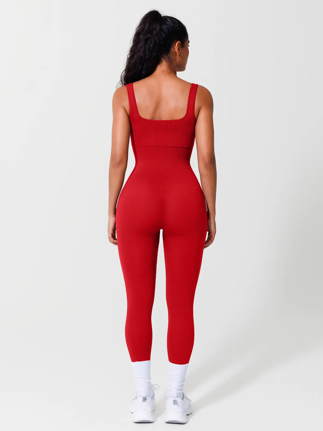 A model wearing a BRXL® Seamless Square Neck Tummy Control Jumpsuits in