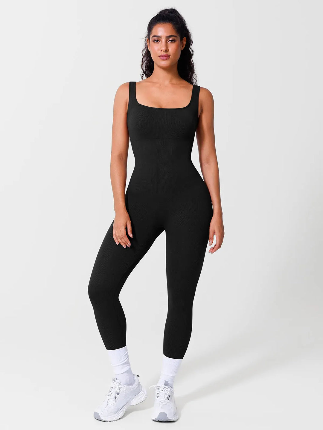 A model wearing a BRXL® Seamless Square Neck Tummy Control Jumpsuits in Tank / Black / S