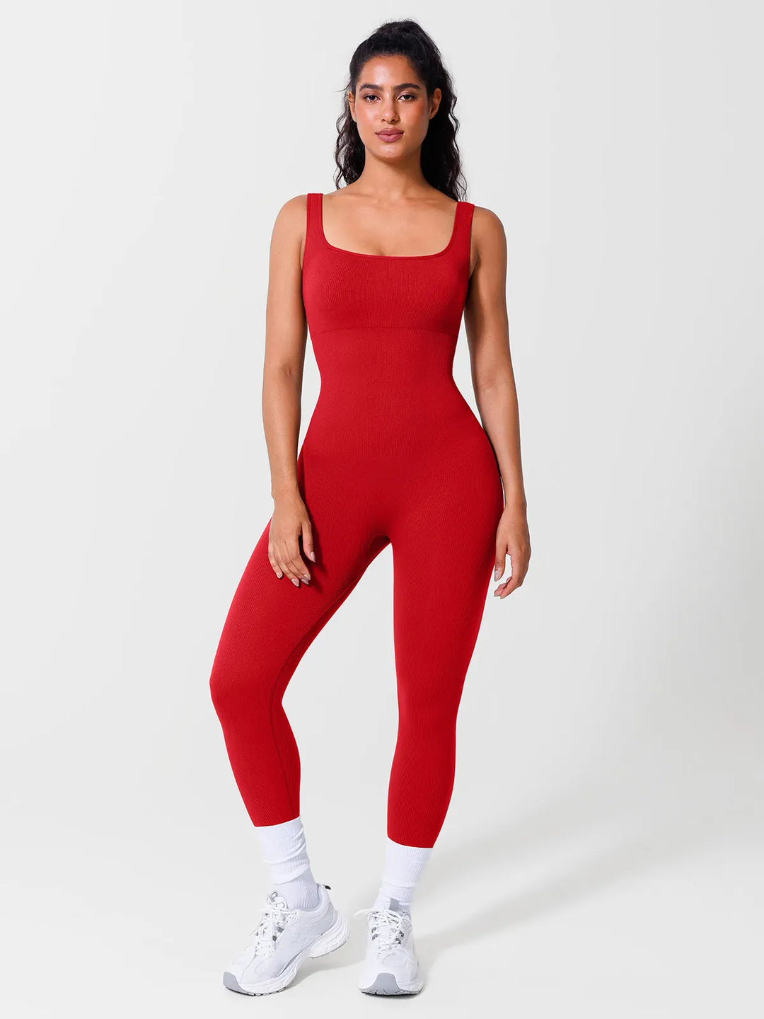 A model wearing a BRXL® Seamless Square Neck Tummy Control Jumpsuits in Tank / Red / S