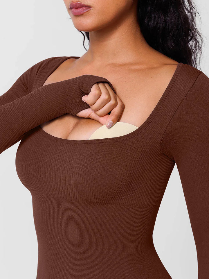 A model wearing a BRXL® Yoga Activewear Jumpsuit Winter Shapewear Long Sleeve Thumb Hole Jumpsuit in