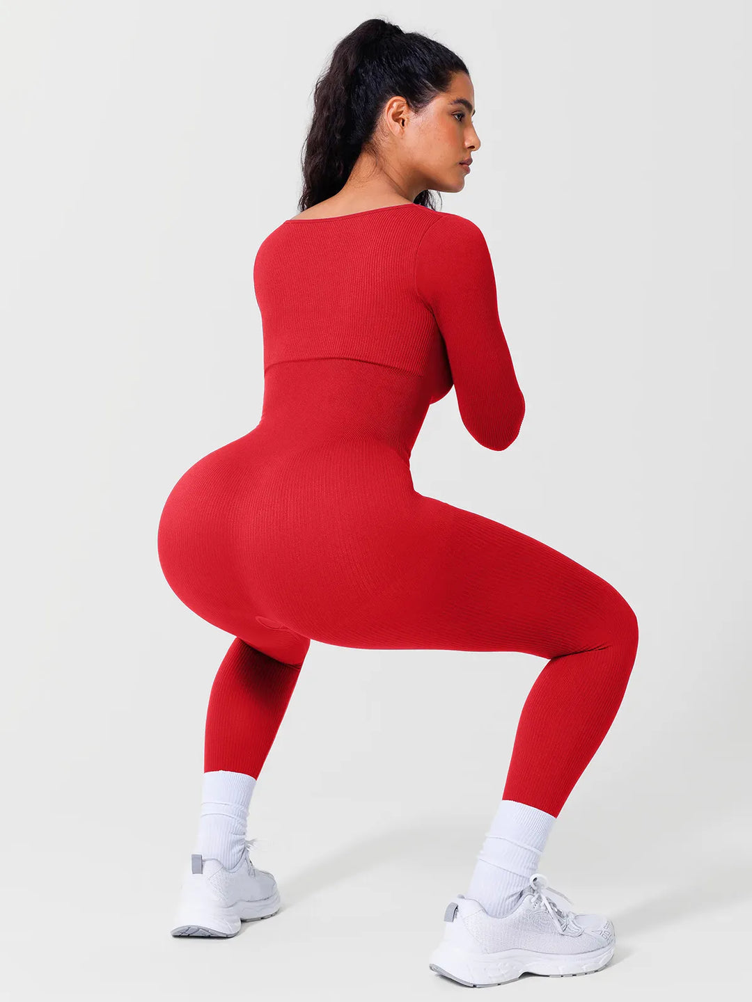 A model wearing a BRXL® Yoga Activewear Jumpsuit Winter Shapewear Long Sleeve Thumb Hole Jumpsuit in