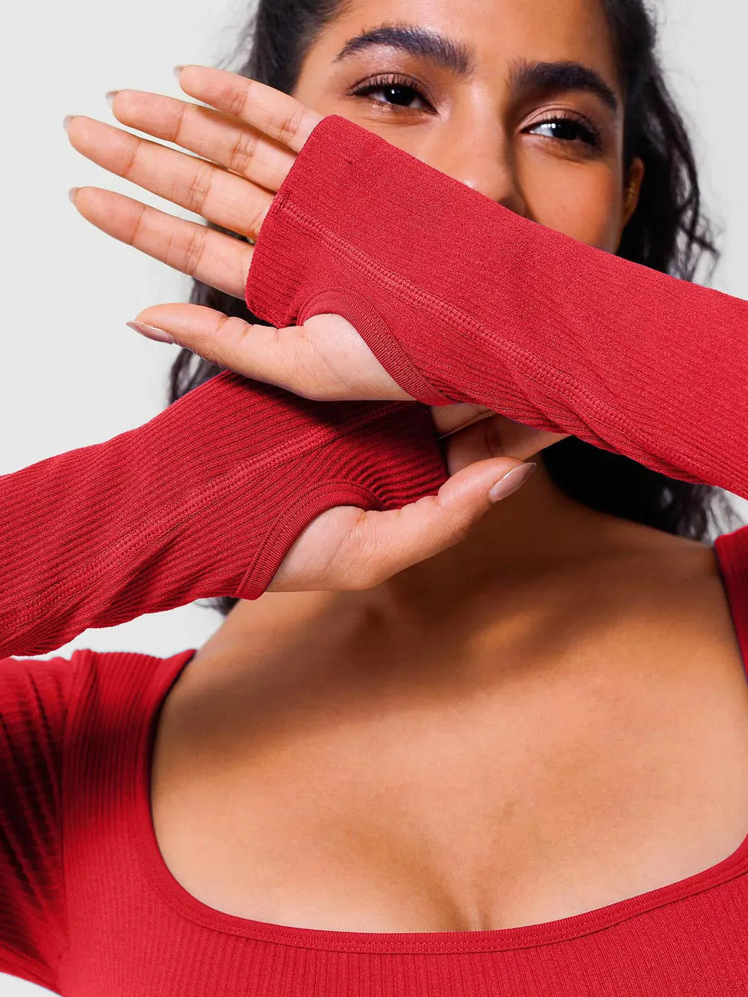 A model wearing a BRXL® Yoga Activewear Jumpsuit Winter Shapewear Long Sleeve Thumb Hole Jumpsuit in