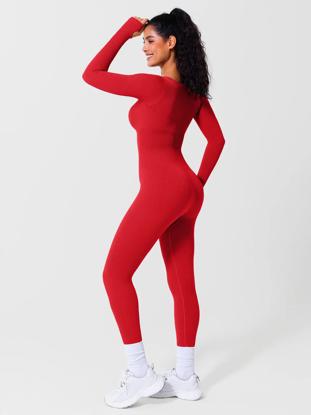 A model wearing a BRXL® Yoga Activewear Jumpsuit Winter Shapewear Long Sleeve Thumb Hole Jumpsuit in