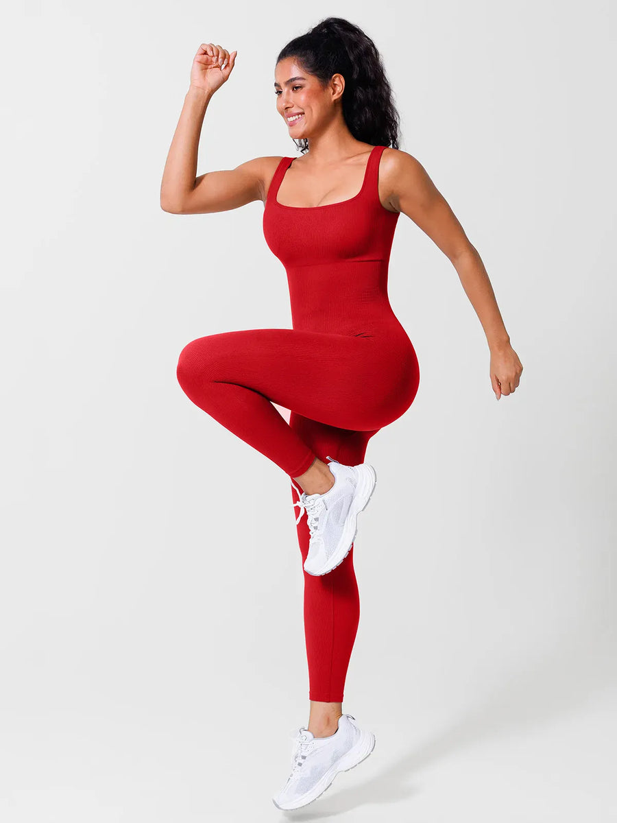 A model wearing a BRXL® Yoga Activewear Jumpsuit Shapewear Seamless Square Neck Tank Workout Jumpsuit in