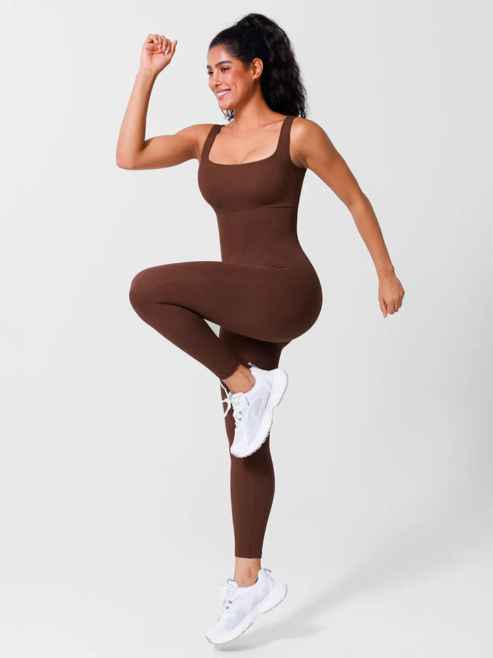 A model wearing a BRXL® Yoga Activewear Jumpsuit Shapewear Seamless Square Neck Tank Workout Jumpsuit in