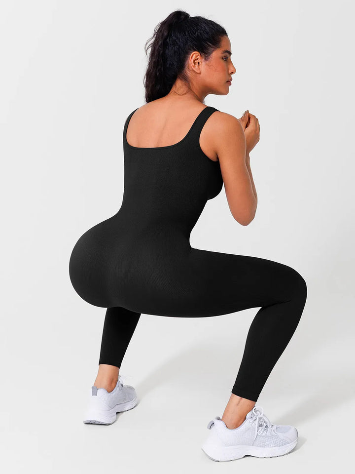 A model wearing a BRXL® Yoga Activewear Jumpsuit Shapewear Seamless Square Neck Tank Workout Jumpsuit in