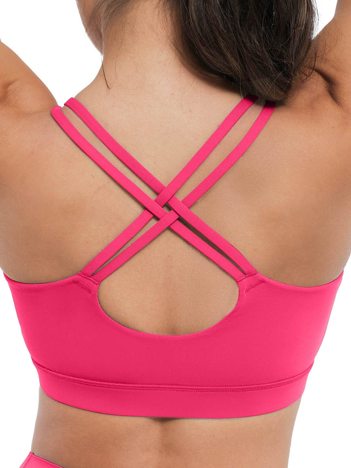 A model wearing a BRXL® Sports Bra Sculpted Shorts Sculpted Leggings Set in Bra / Pink / XS