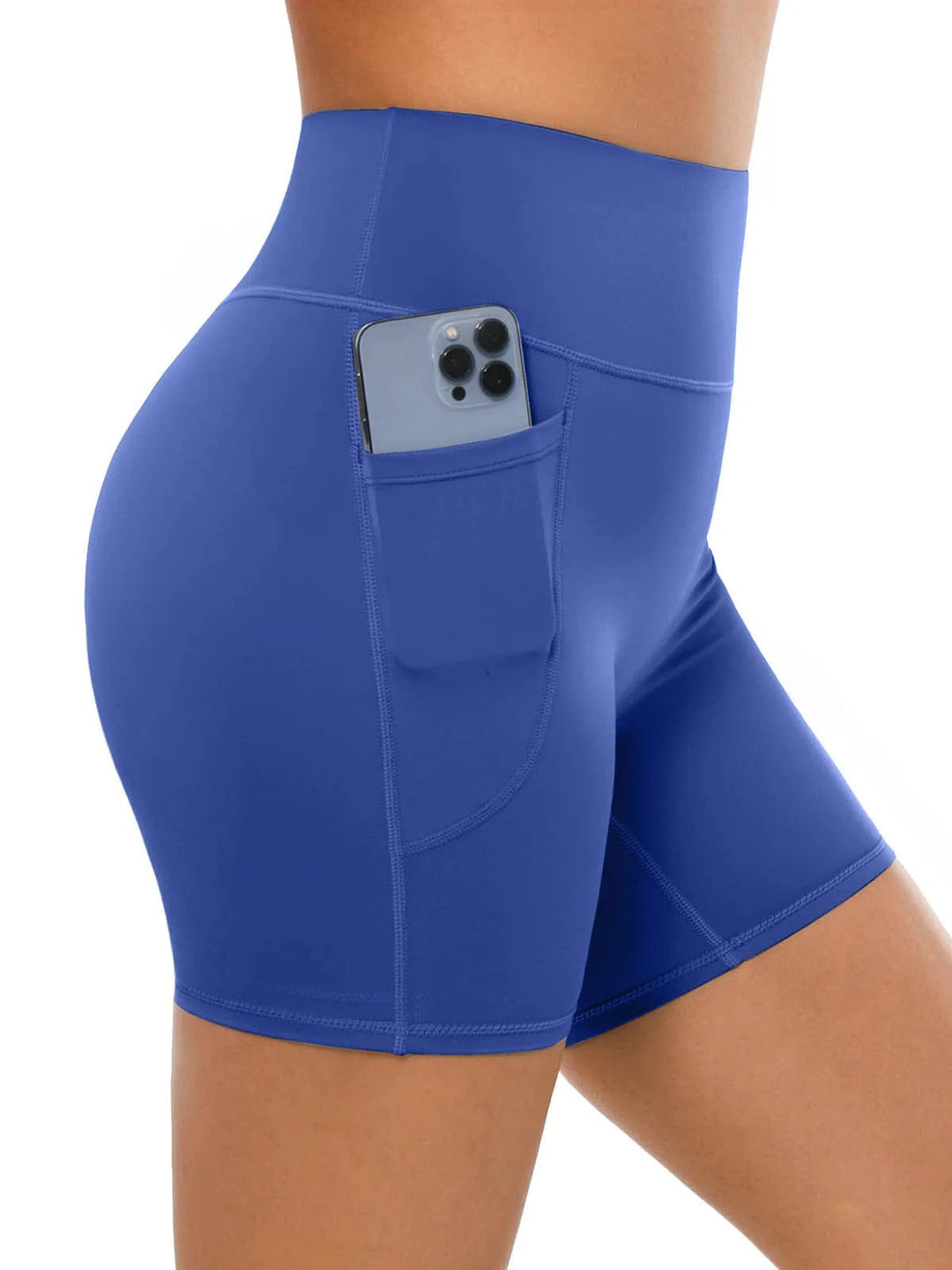 A model wearing a BRXL® Sports Bra Sculpted Shorts Sculpted Leggings Set in Shorts / Blue / XS