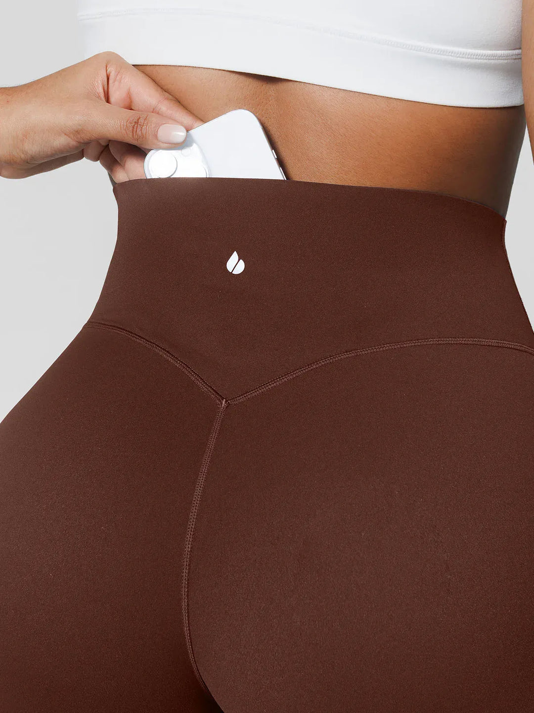 A model wearing a BRXL® Tummy Control Wide Leg Activewear Leggings in