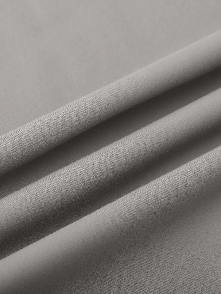 A model wearing a BRXL® Tummy Control Wide Leg Activewear Leggings in