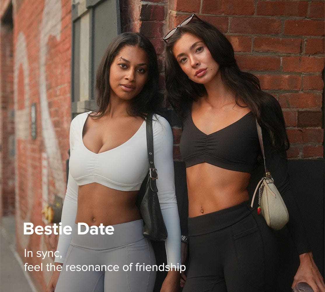 Two women standing against a brick wall with the text 'Bestie Date' displayed.