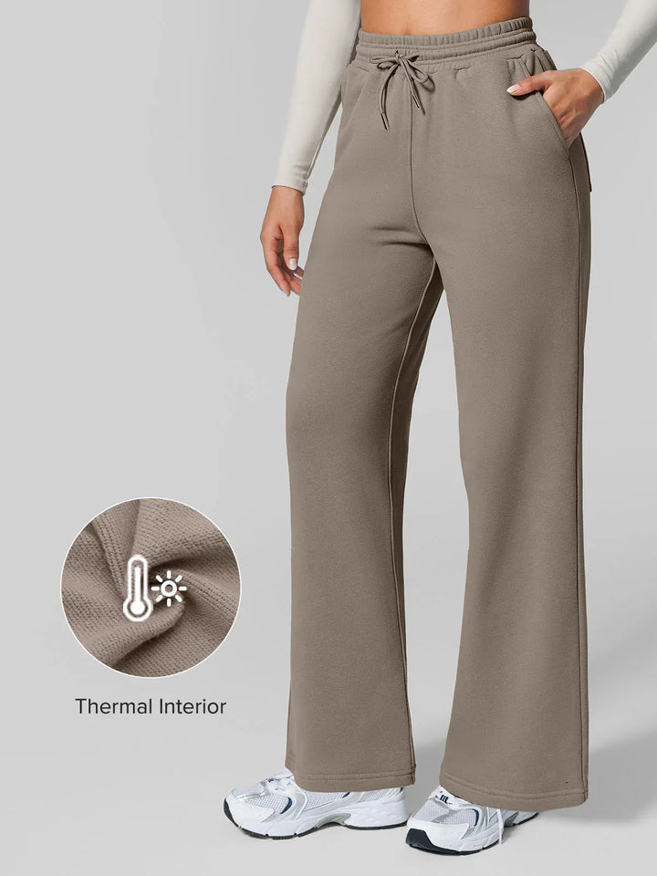 A model wearing a BRXL® Athleisure Drawstring Waist  Wide Leg Sweatpants in