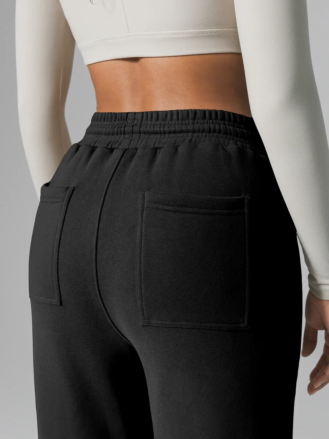 A model wearing a BRXL® Athleisure Drawstring Waist  Wide Leg Sweatpants in