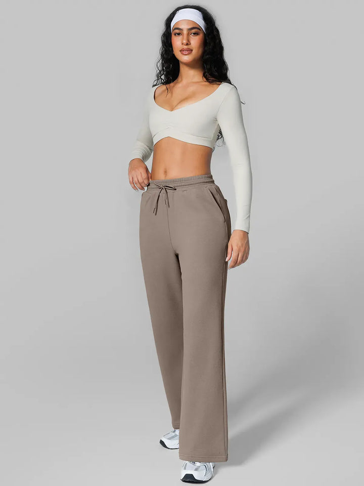 A model wearing a BRXL® Athleisure Drawstring Waist  Wide Leg Sweatpants in