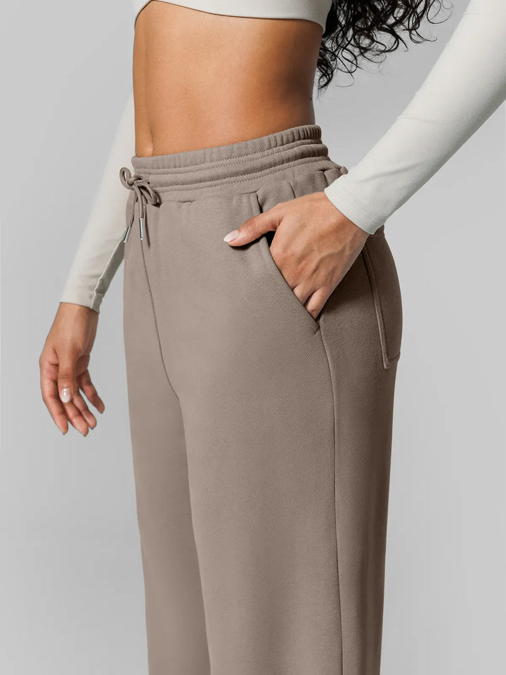 A model wearing a BRXL® Athleisure Drawstring Waist  Wide Leg Sweatpants in